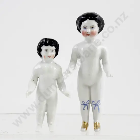Two Victorian Glazed China Frozen Charlotte Dolls