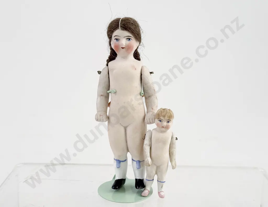 Two Victorian All Bisque Dolls with moving arms Image 1++