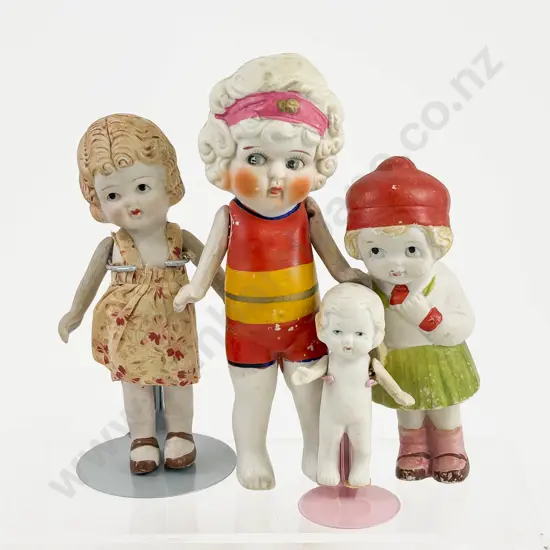 C1920's Four Japanese All Bisque Character Dolls all painted features with moving arms