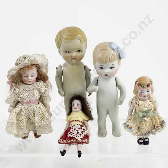 Five German and Japanese All Bisque Dolls all painted features with moving arms