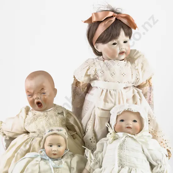 New Bisque Screaming Baby and Three Character Dolls
