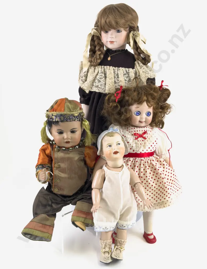 New Bisque Oriental Character Doll with Googly - Bonnet Head and Girl Image 1++