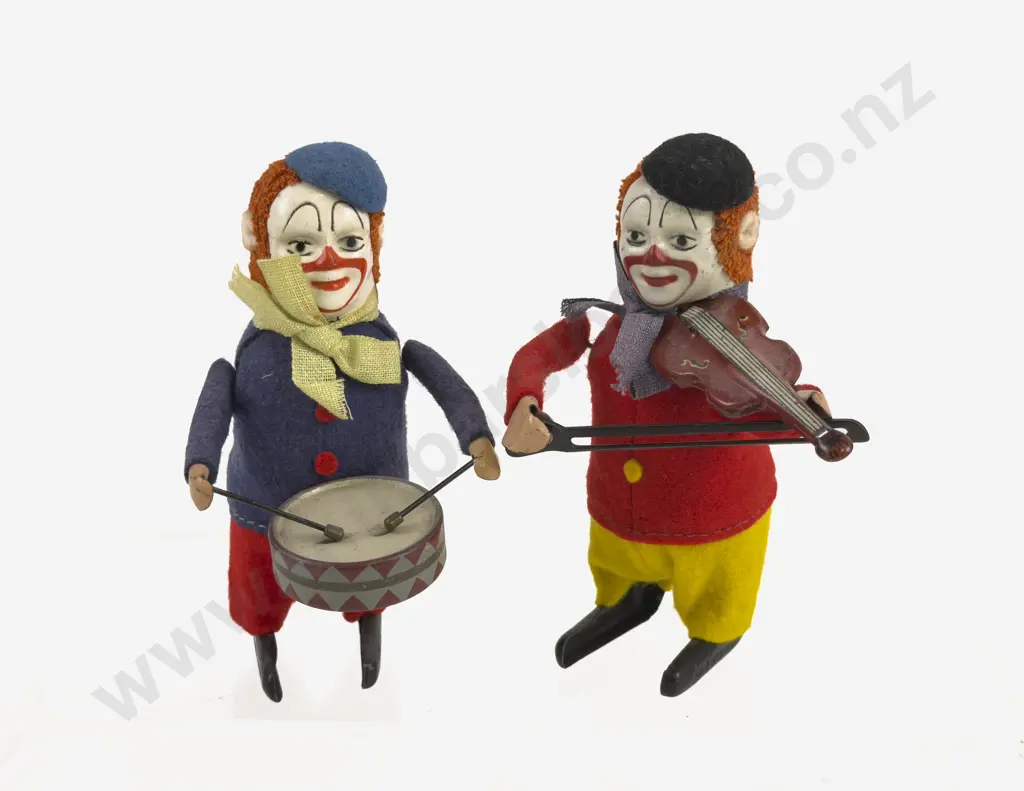 Schuco Violin Playing and Drumming Clowns Image 1++