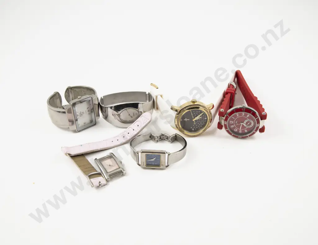 Louis Thompson Ladies Wrist Watch and Five Others Image 1++