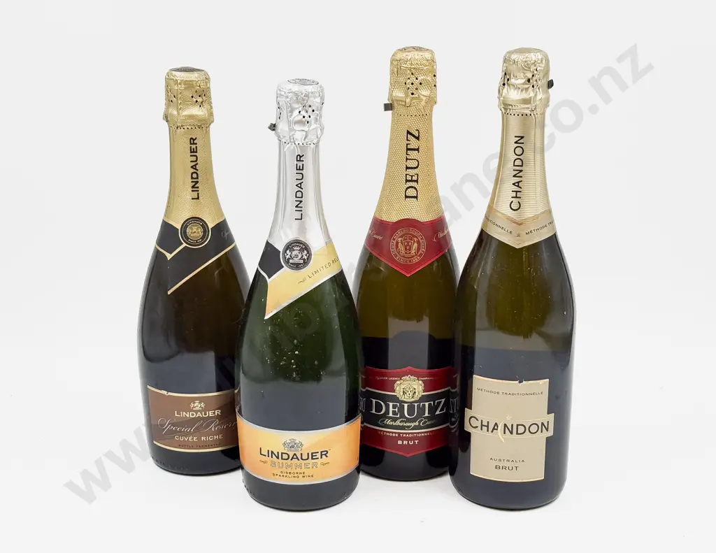 Four Bottles of Assorted Sparkling Wine Image 1++
