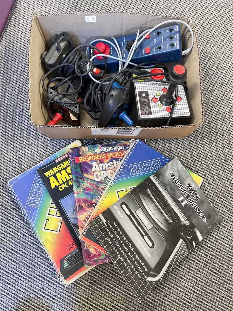 Box Qty of Assorted Vintage Gaming Controllers & Console Manuals etc Image 1++