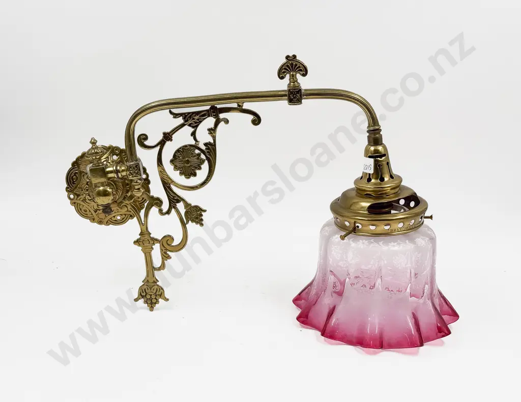 A Brass Single Branch Wall Light with Glass Shade Image 1++