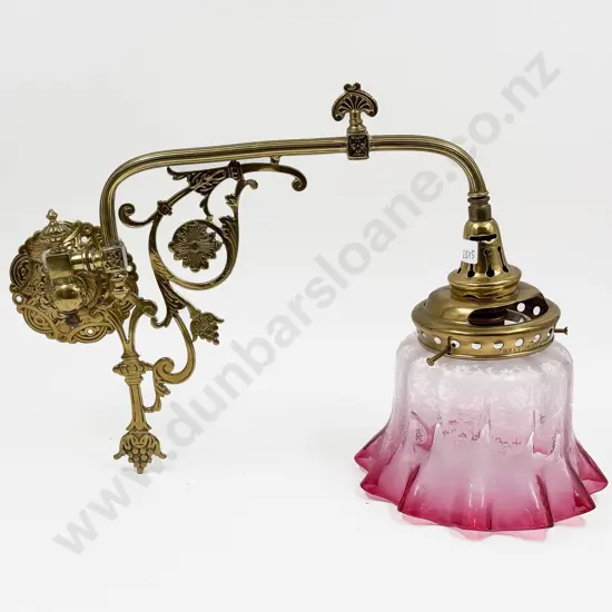 A Brass Single Branch Wall Light with Glass Shade