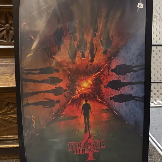 Two Framed Posters - Jurassic Park and Stranger Things