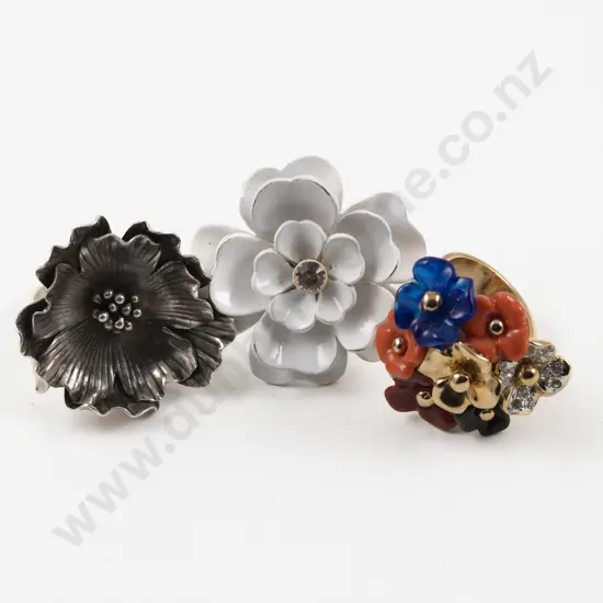 Two Mimco Floral Rings with Other