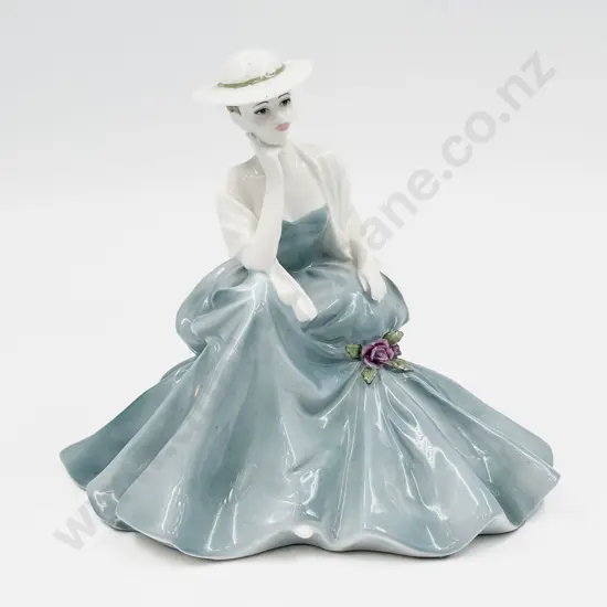 Coalport Seated Figure
