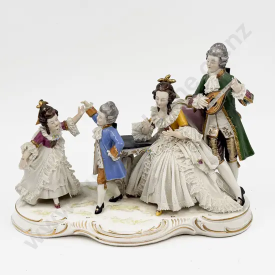 A Dresden China Lace Figure Group