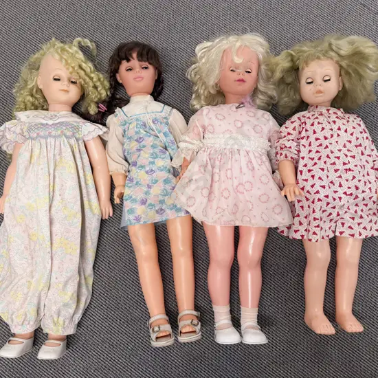 Four Large Play Dolls and Three Large Italian Dolls