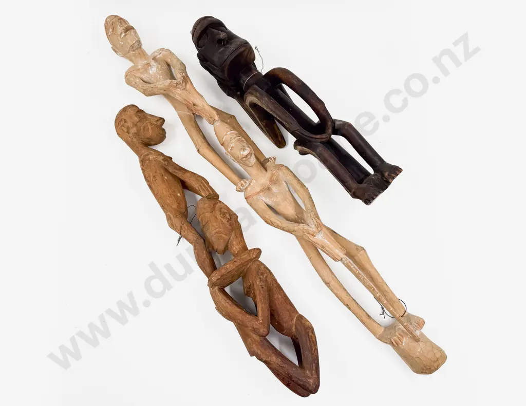 Three Assorted Carved PNG Figures Image 1++