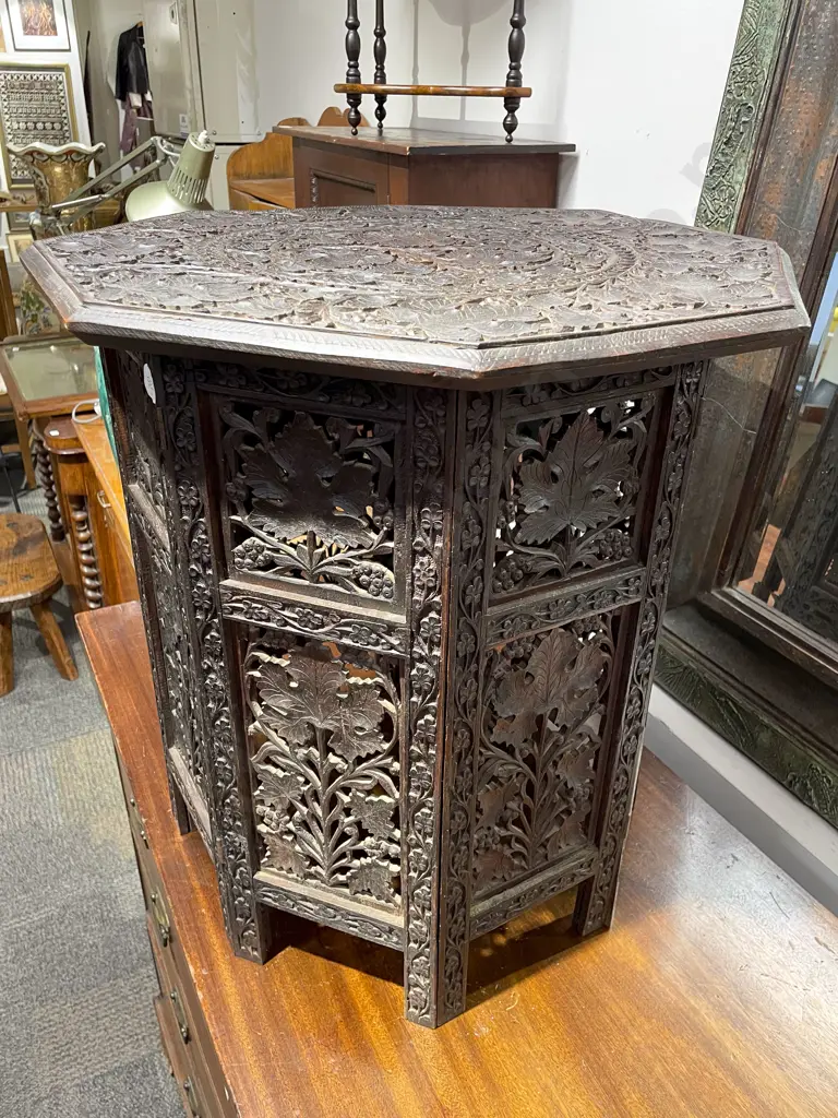 Heavily Carved Octagonal Side Table With Folding Base Image 1++