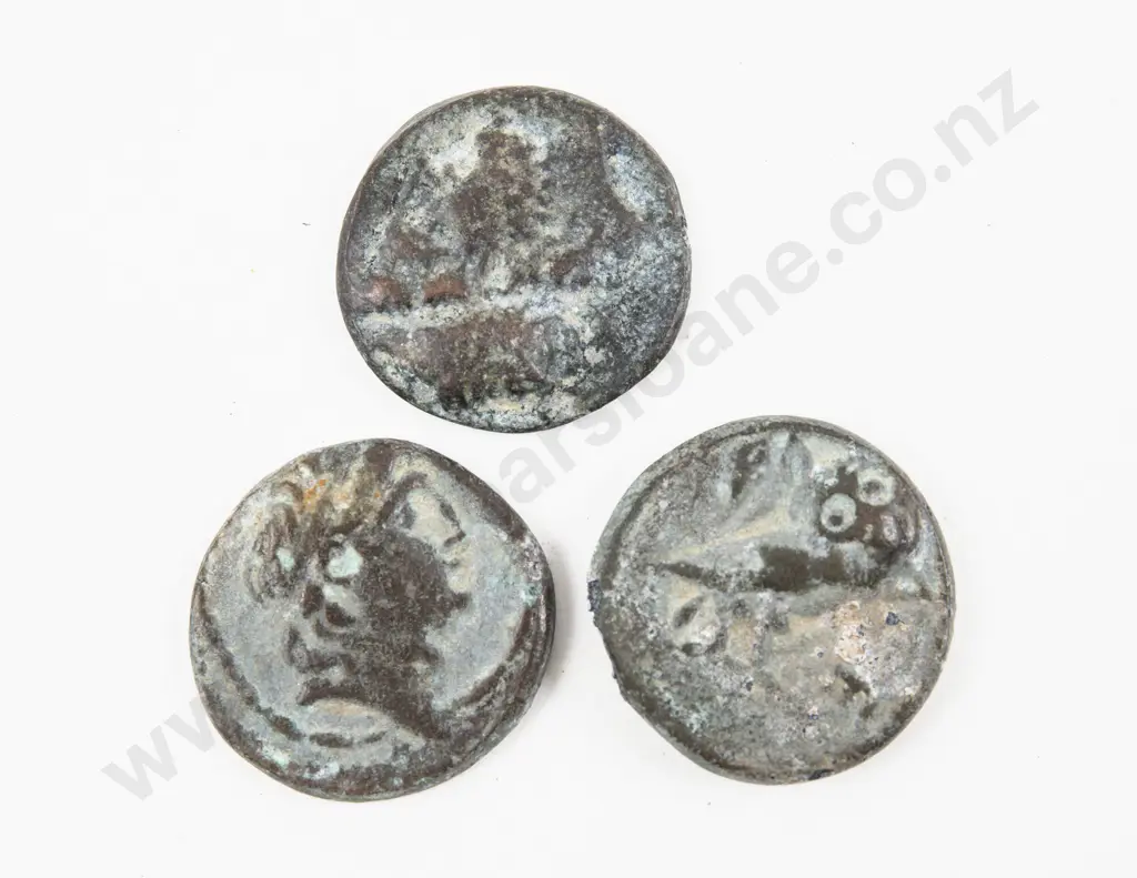 Three (Roman?) Bronze Coins Image 1++