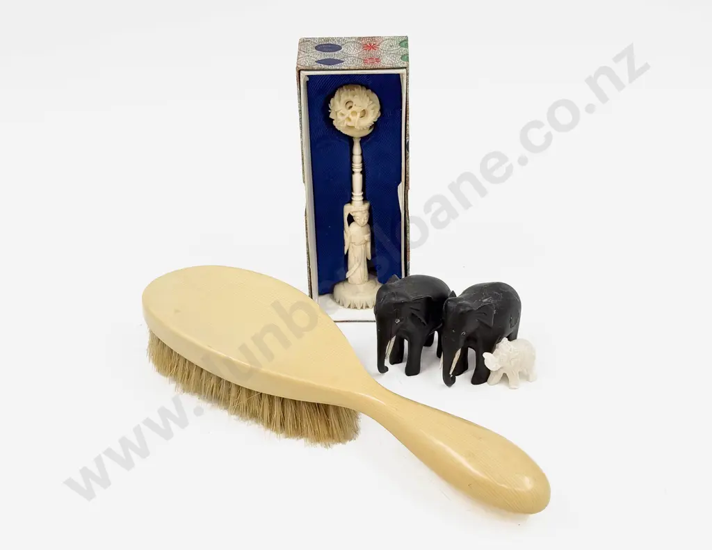 Small Boxed Puzzle Ball and Stand Together with Elephant Ornaments and Dressing Table Brush Image 1++