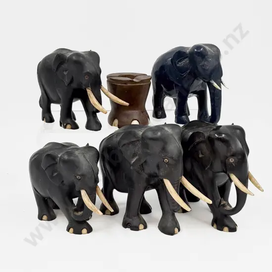 Four Ebony Elephants and Two Others