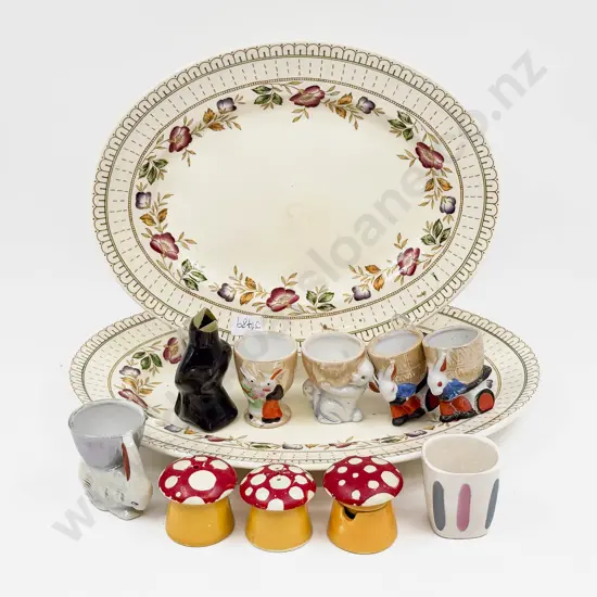 Qty of Assorted Novelty Egg Cups on Graduated Pair of Ashettes