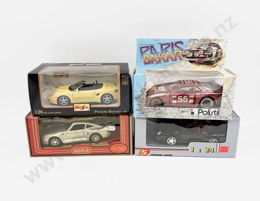 2 Boxed 1:24 Scale Porsche Models Image 1++