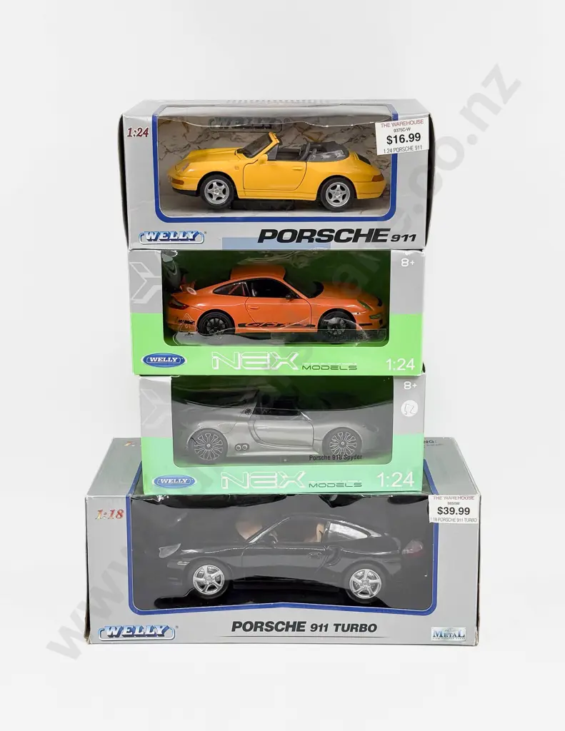 Four Boxed 1:24 Scale  Porsche Models Image 1++