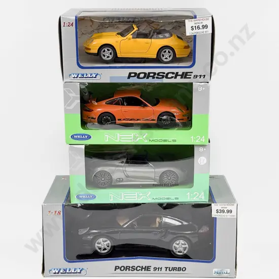 Four Boxed 1:24 Scale  Porsche Models
