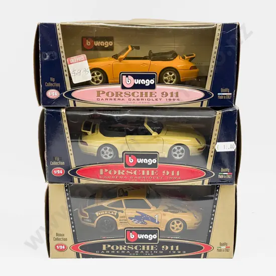 Three Boxed Burago 1:24 Scale Porsche 911 Carrera Models