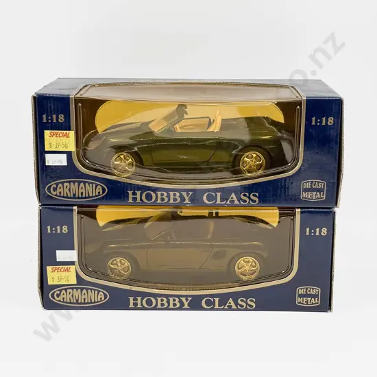 Two Boxed Carmania 1:18 Scale Porsche Models
