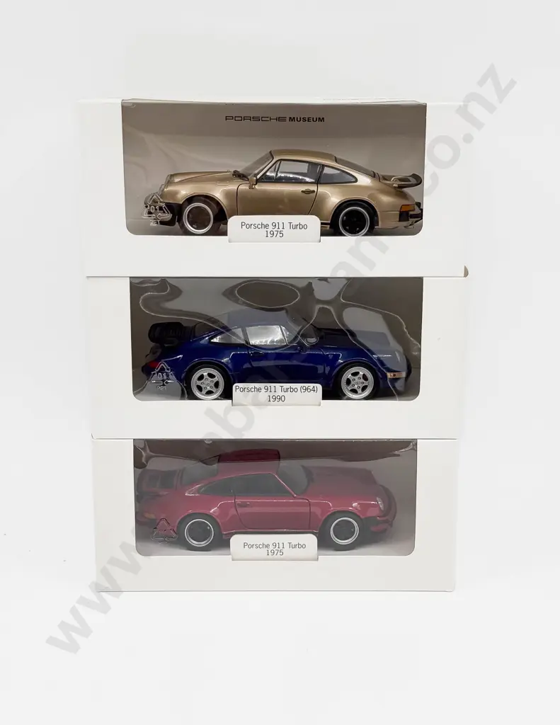 Two Boxed Porsche Museum 1:24 Scale Porsche 911 Turbo Models Image 1++