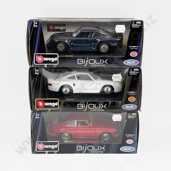 Three Boxed Burago 1:24 Porsche Models