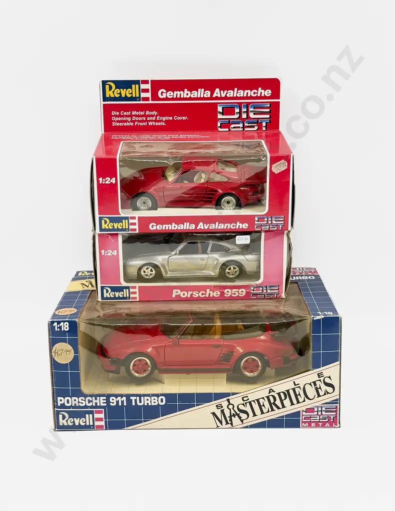 Two Boxed Revell 1:24 Scale Porsche Models and One Boxed 1:18 Porsche Model Image 1++