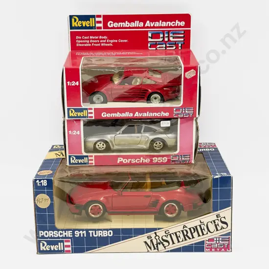 Two Boxed Revell 1:24 Scale Porsche Models and One Boxed 1:18 Porsche Model