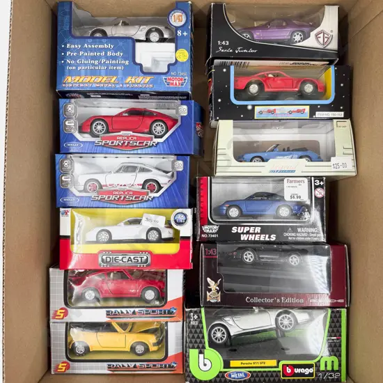 Twelve Boxed Mixed Manufacture Porsche Models