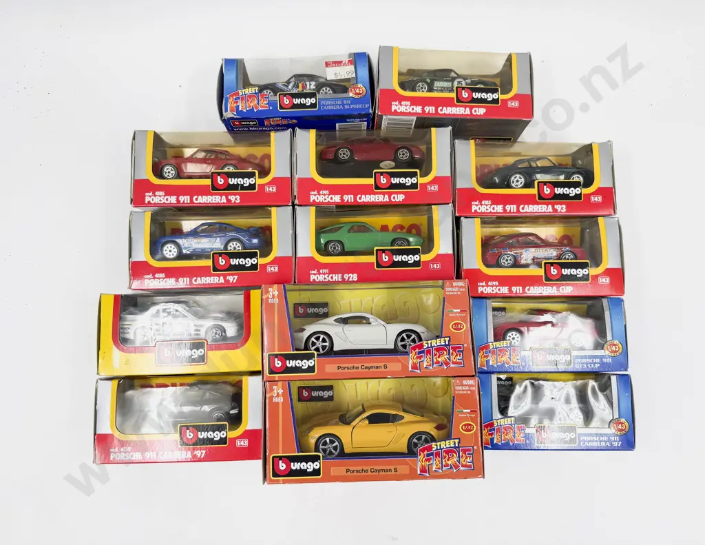 Twelve Boxed Burago 1:43 and Two 1:32 Porsche Models Image 1++