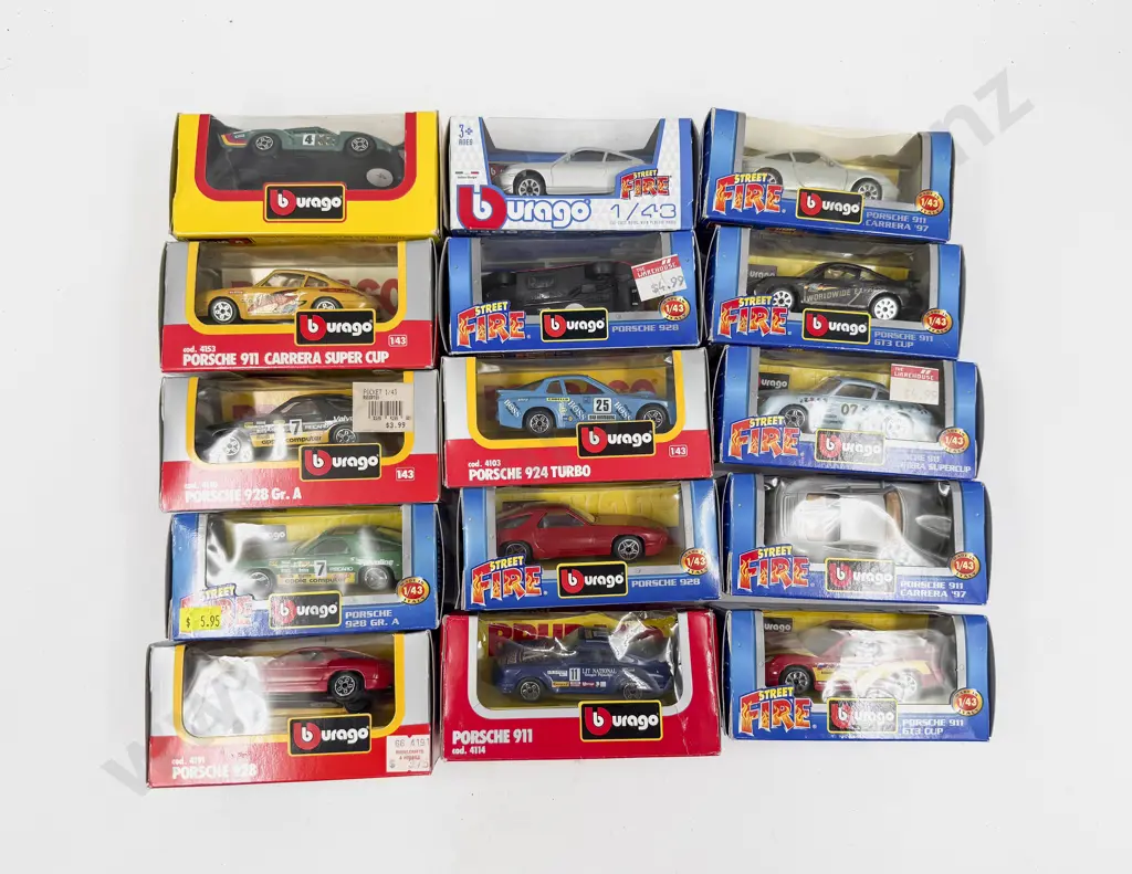 Fifteen Boxed Burago 1:43 Scale Porsche Models Image 1++