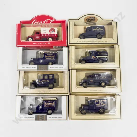 Seven Boxed Lledo Cadbury Models and Single Coke Model
