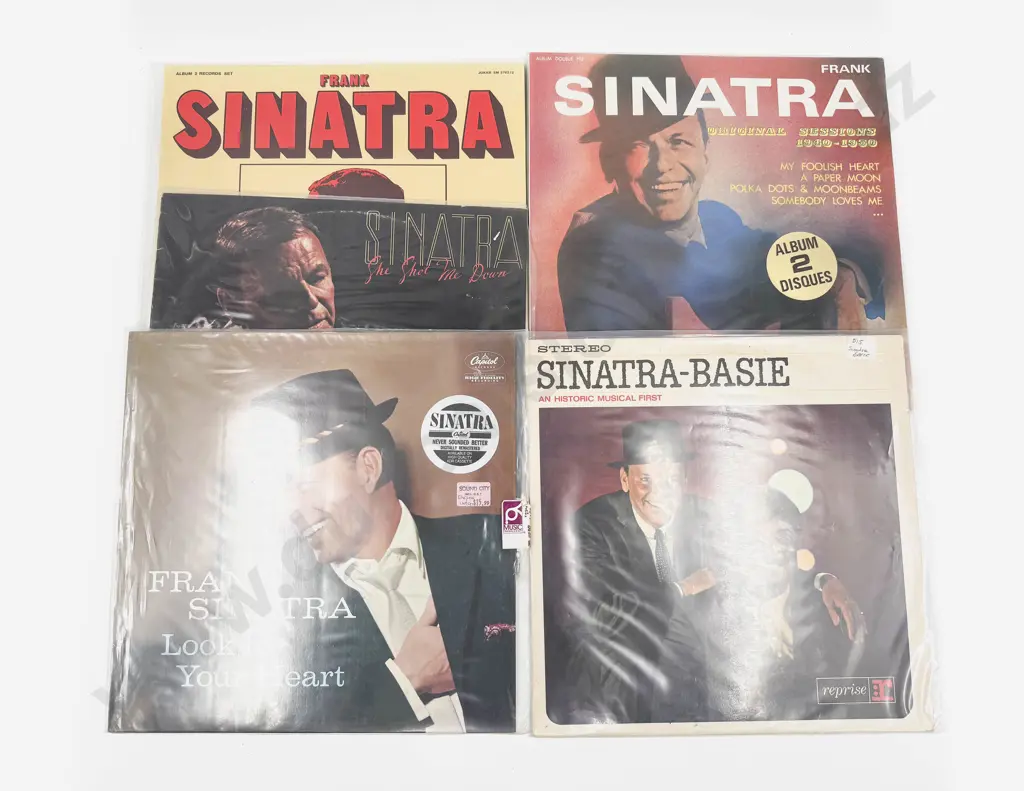 Four Assorted Vinyl Records Image 1++