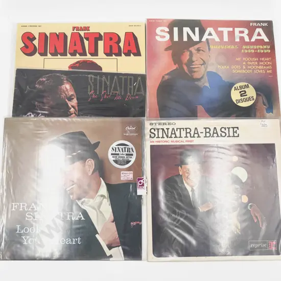 Four Assorted Vinyl Records
