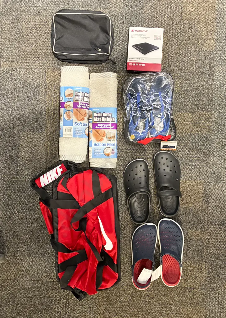 Suitcase and Assorted Clothing and Foot Ware Image 1++