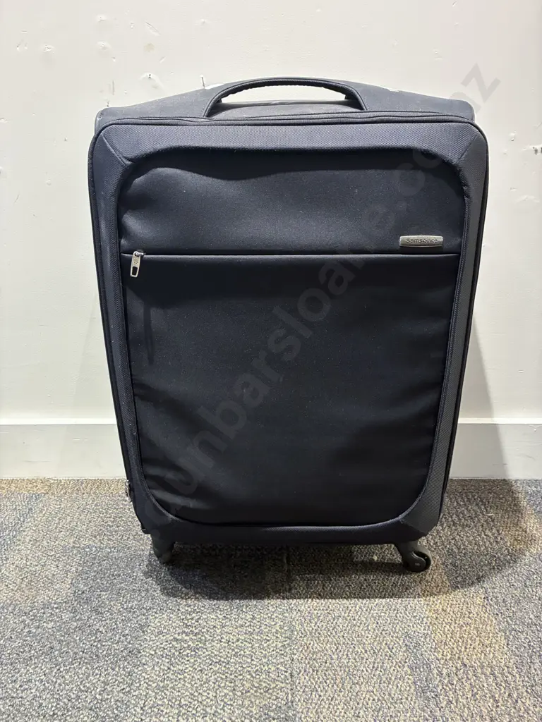 Suitcase and Assorted Clothing and Foot Ware Image 1++