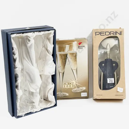 Two Boxed Champagne Glasses Together with Boxed Bottle Opener