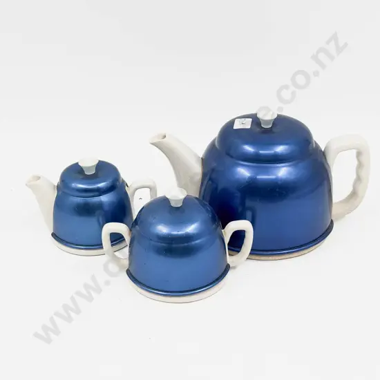 Two Ceramic Teapots and Sugar Basket with Vintage Metal Cosies