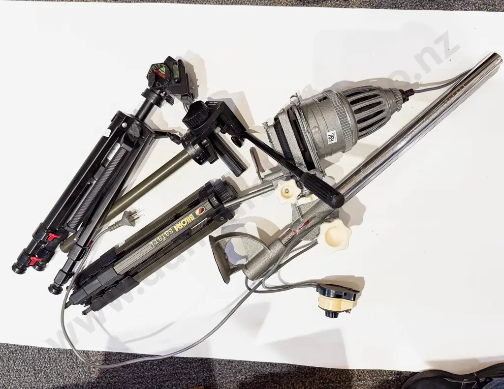 Photographic Enlarger Together with Three Tripods Image 1++