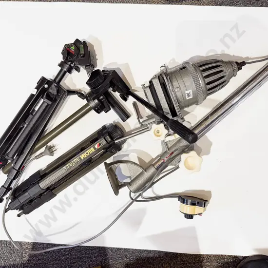 Photographic Enlarger Together with Three Tripods