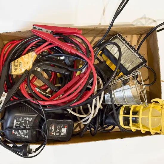 Box of Assorted Including Black and Decker Battery Charger and Battery With Jumper Cables and Work Lights