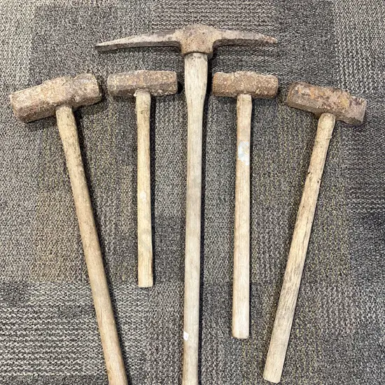 Four Assorted Vintage Sledgehammers Together with Pick Axe