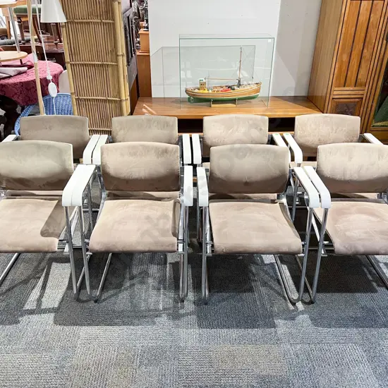 Eight Wilkhahn Chrome Framed and Suede Seated Stacking Arm Chairs