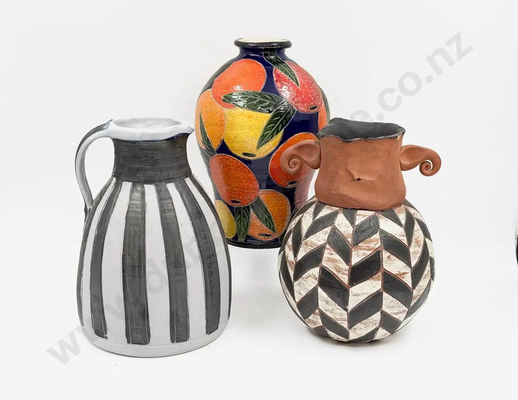 Two Pottery Vases Together With Decorative Jug Image 1++