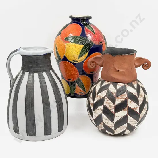 Two Pottery Vases Together With Decorative Jug
