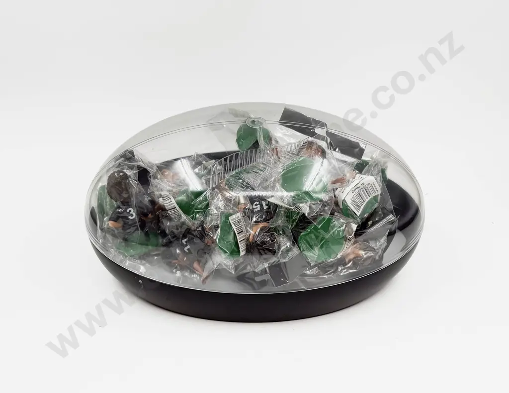 All Black Figures in Rugby Ball Container Image 1++